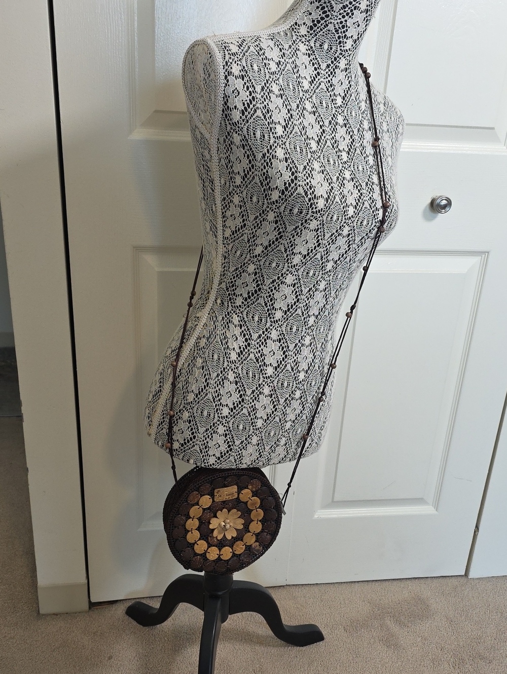 Round Woven Crossbody Bag with Floral Wood Accents